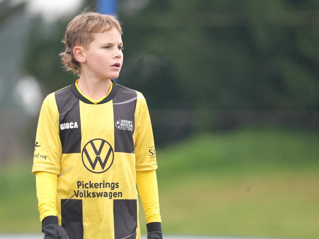 Young soccer player with Jeremy Brockie jersey